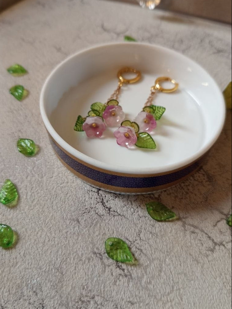 ASHEQATAL WARD earrings