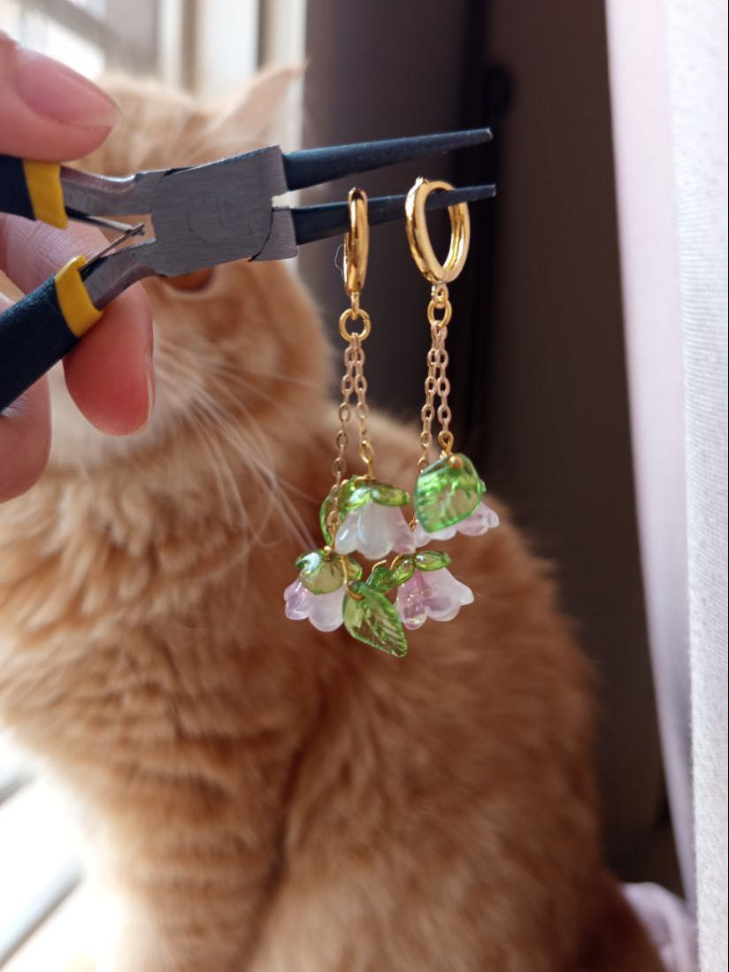 ASHEQATAL WARD earrings
